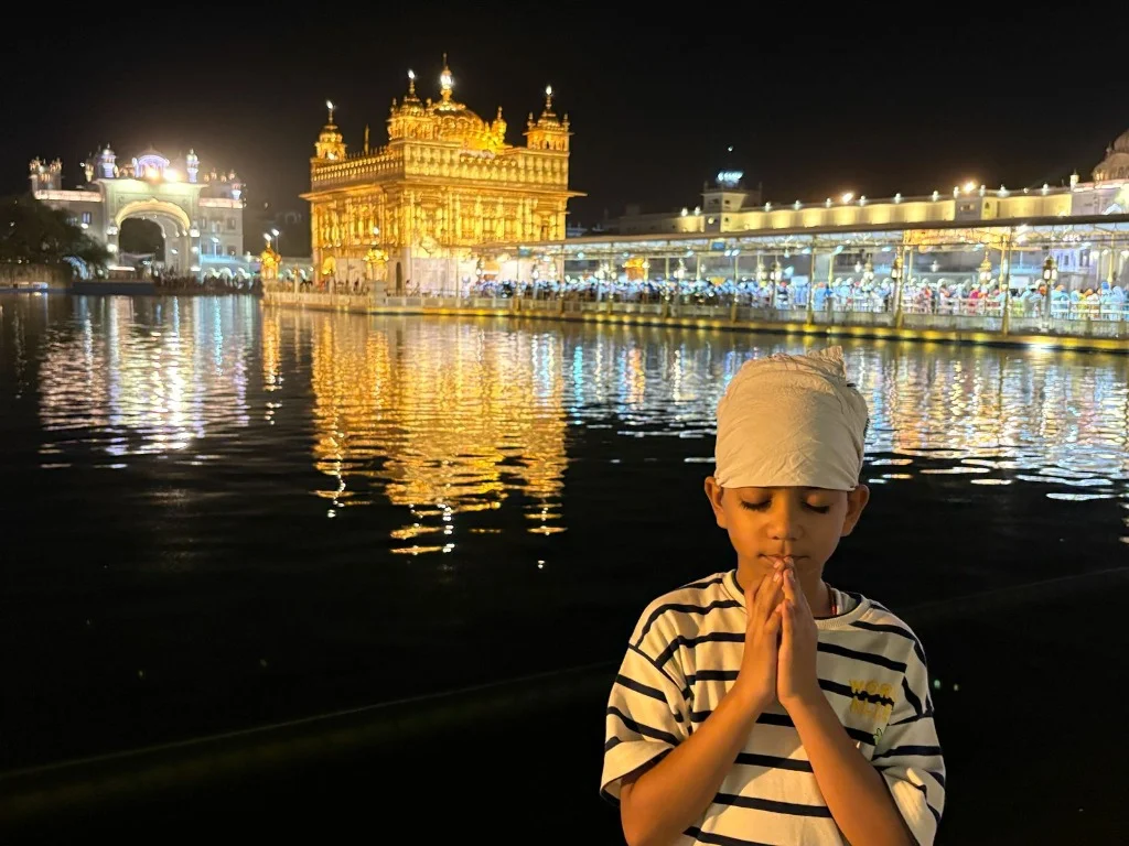 Aayaan praying at the Golden Temple in Amritsar